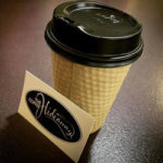A photo of a take away coffee from The Coffee Hideaway
